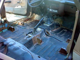 A view to the front of the car with the stripped interior